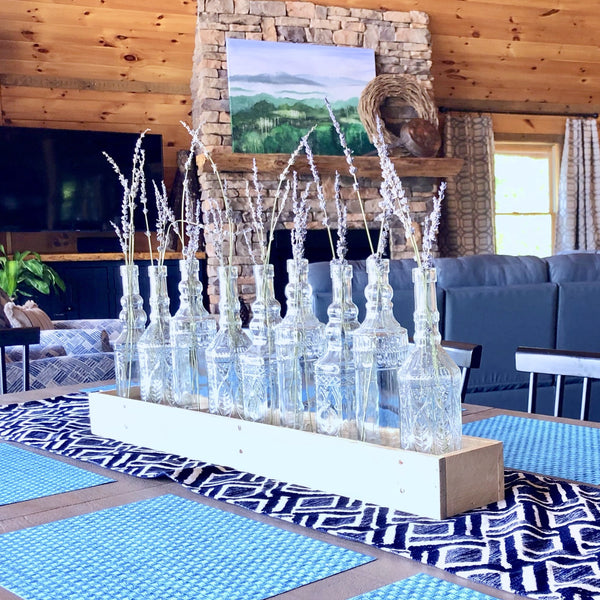 Large trough from reclaimed pallet wood with 9 decorative glass bottles